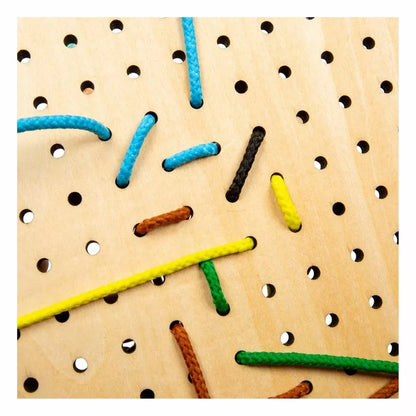 A close up of a peg board with many different colored Bigjigs House Lace-A-Shape objects.