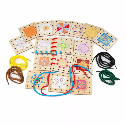 A group of Bigjigs Lacing Tiles with different designs on them.