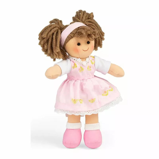 A Bigjigs Rose Doll Small wearing a pink dress and pink shoes.