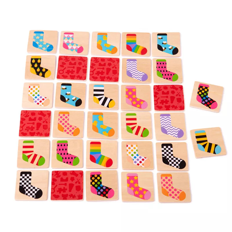 A colorful Bigjigs Sock Memo Game with socks on a wooden board.