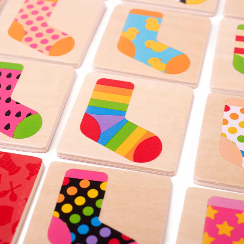 A set of wooden puzzles featuring Bigjigs Sock Memo Game, perfect for a memo game.