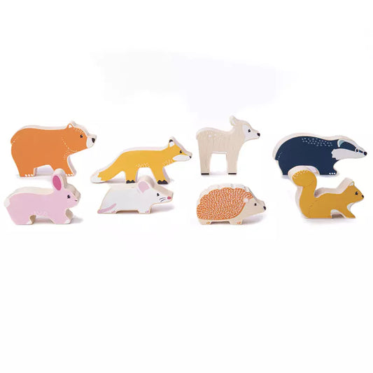 A group of Bigjigs Woodland Animal Set figurines sitting next to each other.