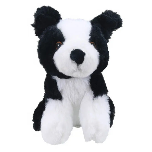 The Wilberry Eco Mini Border Collie is a black and white plush toy with upright ears, round brown eyes, and a soft, fluffy texture. Seated facing forward, it is crafted from eco-friendly recycled materials.