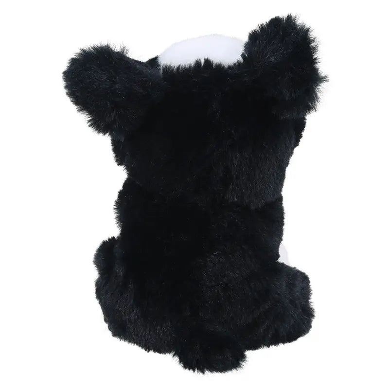 The Wilberry Eco Mini Border Collie is a fuzzy black and white stuffed animal with two upright ears and a round, fluffy body, made from eco-friendly recycled materials, seen from behind—resembling a mini Border Collie.