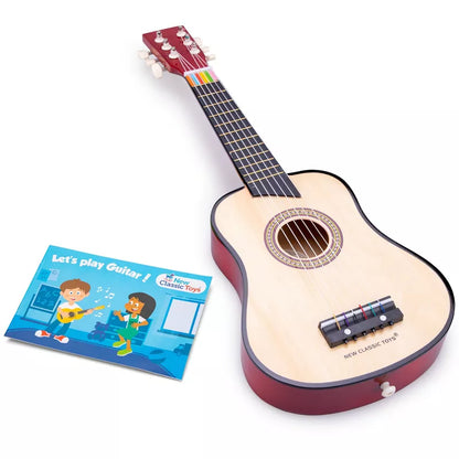 a New Classic Brown Guitar Deluxe with a book and a picture of a boy.