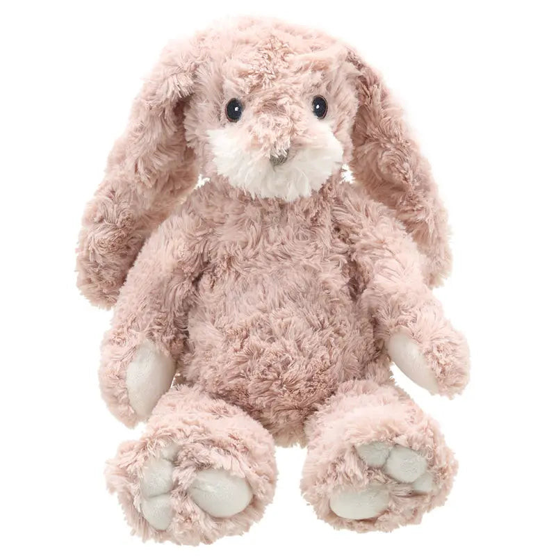 The Wilberry Classic Pink Bunny is a soft, eco-friendly stuffed toy made from recycled materials, featuring light pink plush, long floppy ears, a white snout and paws, and an upright sitting posture.