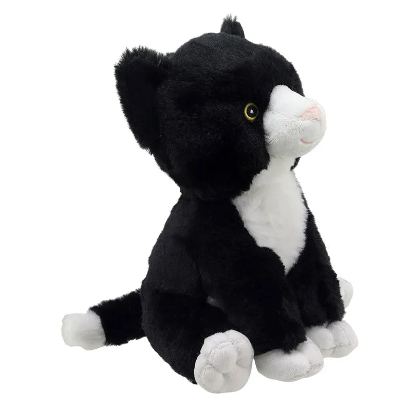 Meet Charlie the Cat ECO Cuddlies, an adorable plush companion made from recycled materials. With striking yellow eyes and a blend of black and white fur, this toy sits upright with its tail tucked neatly behind, creating a charming contrast against its plain white background.