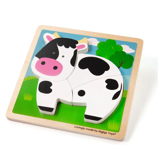 The Chunky Lift Out Puzzle Cow is a charming wooden baby toy featuring a black and white cow with a pink nose set against grass, trees, and clouds. This delightful puzzle helps develop fine motor skills as each piece fits snugly into the square base.