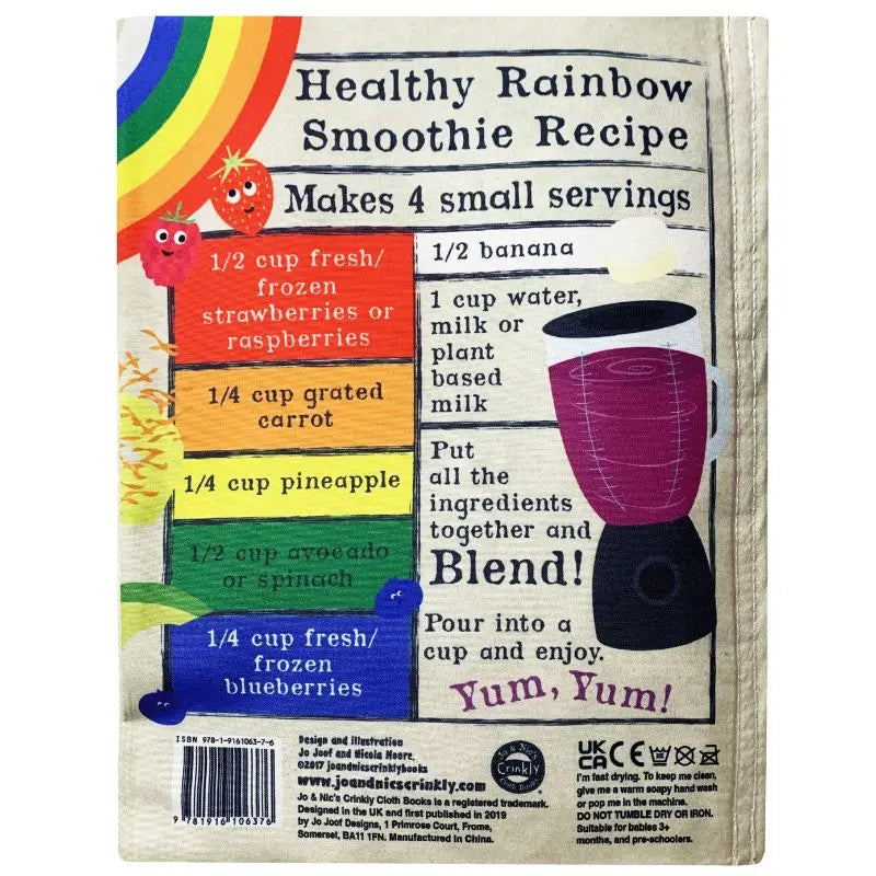 The Crinkly Cloth Book Rainbow Smoothie features a vibrant recipe card with labeled fruit, a rainbow, and blender images. Step-by-step instructions show how to blend fruit, carrot, avocado, water, and milk—just like in a baby’s first cookbook.