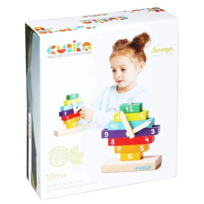 A boxed set of the Cubika ECO Wooden Construction Clock, a children's educational toy, featuring a wooden learning clock puzzle with removable colorful numbered blocks. The box showcases a young child playing with the developmental toy, which is suitable for children aged 18 months and older.