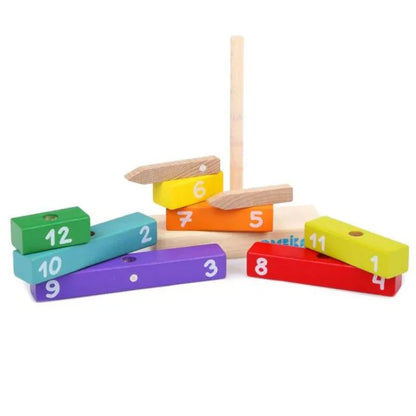 The Cubika ECO Wooden Construction Clock is a vibrant wooden stacking toy with numbered blocks from 1 to 12, featuring blocks of various lengths painted in eye-catching colors such as green, teal, purple, orange, yellow, red, and blue. These colorful blocks are stacked around a central vertical peg for an engaging play and learning experience.