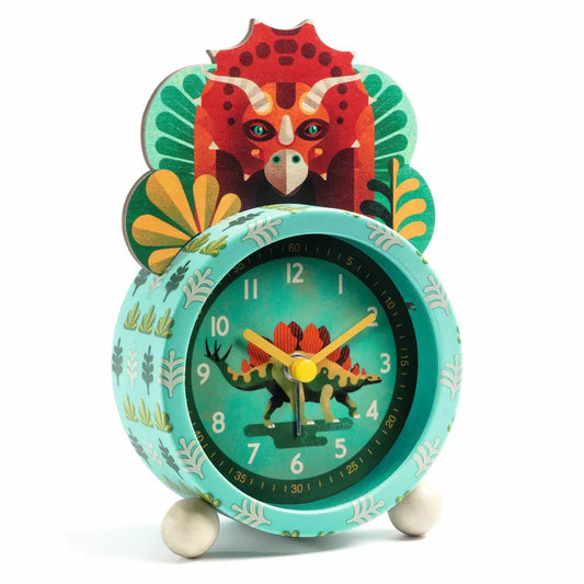 A Djeco Dinosaur Alarm Clock with a picture of a fox on it.