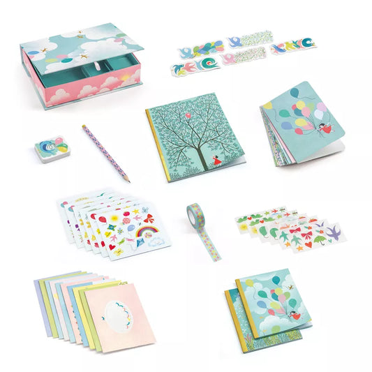 A variety of Djeco Correspondence Charlotte Box Set items, including a notebook, a pencil case, and a notepad with cute illustrations.