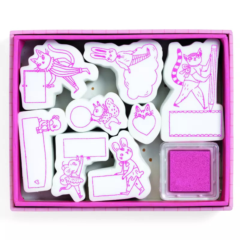 A pink box containing a set of Djeco Correspondence Lucille Message Stamps and an ink pad.