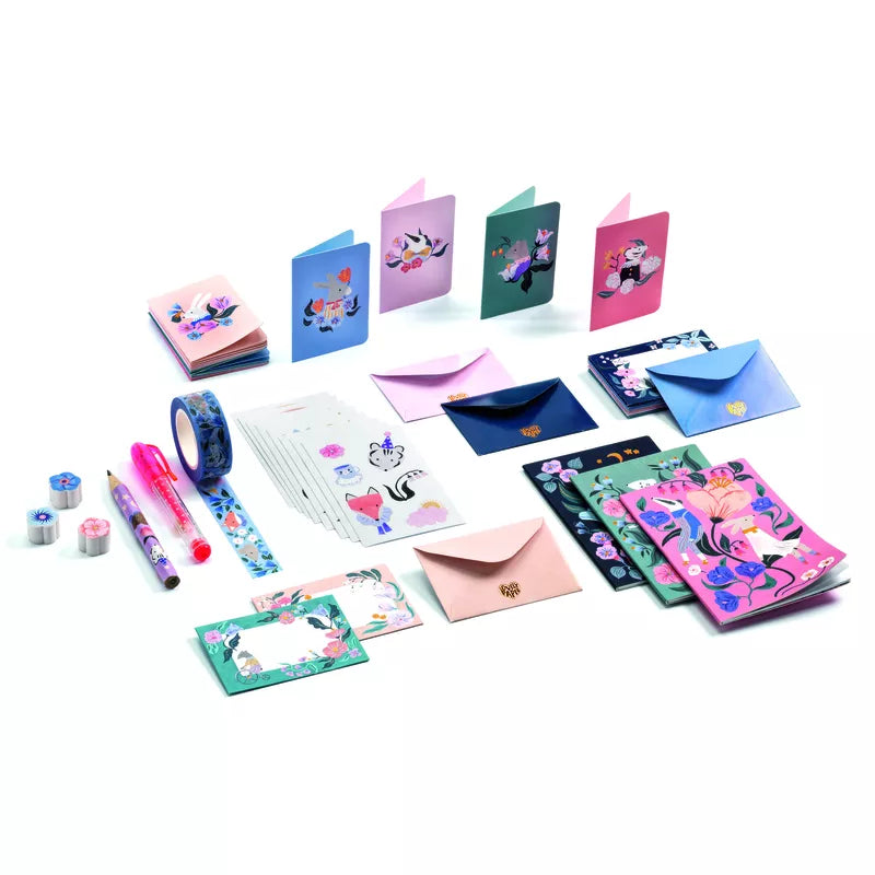 A collection of Djeco Correspondence Cécile Mini Writing Set items and stickers.