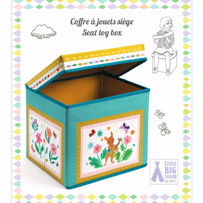 A book with a picture of a Djeco Seat Toy Box - Caravan.