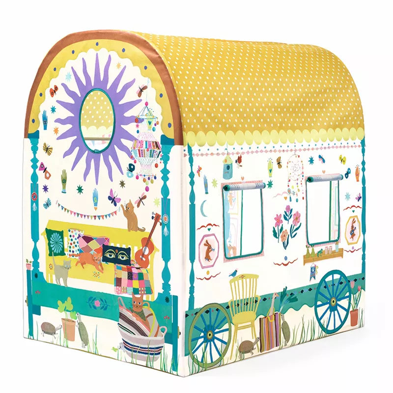 A Djeco TentS Caravan with a wagon on it designed as a toy for children.