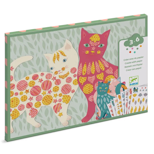 The Djeco Small Gifts For The Little Ones Elodie’s cute cats craft kit includes a green box with a handle, showcasing colorful cat illustrations and stickers. Designed for ages 3 to 6, it promotes fine motor skills through engaging activities.