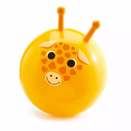 A yellow Djeco Balls Jumpy Gigi with a giraffe on it.