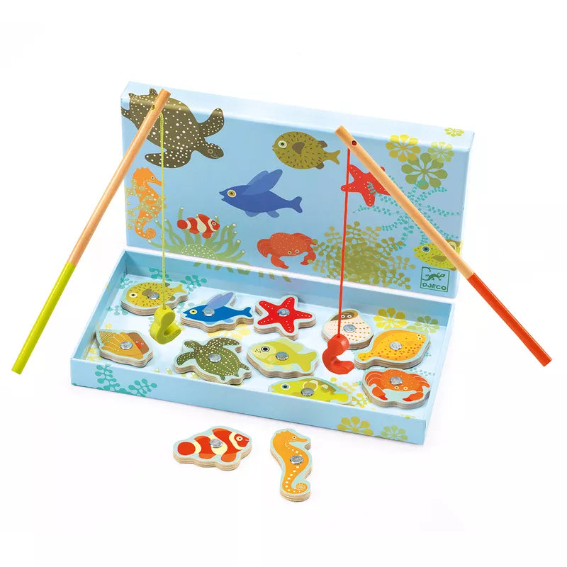 A Djeco Magnetic Fishing Tropic Game box with a pair of chopsticks in it.