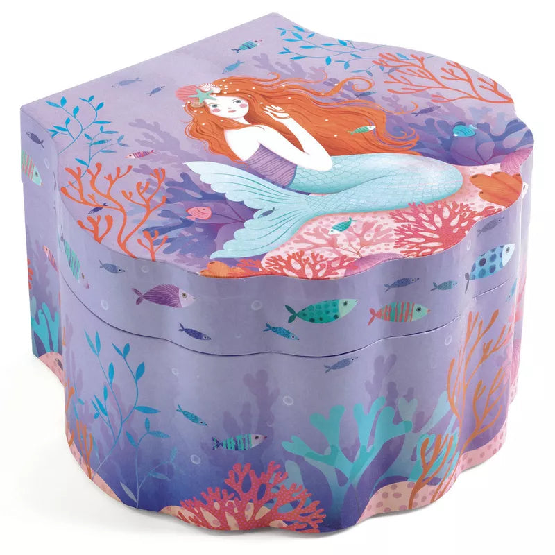 A purple Djeco Musical Box Enchanted Mermaid.