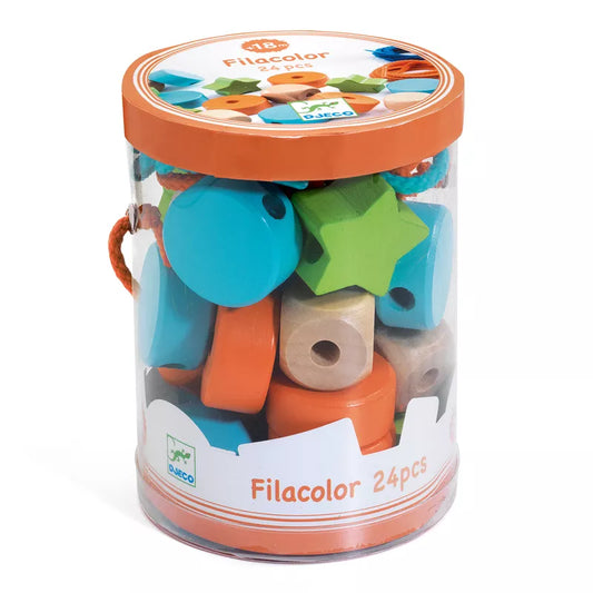 A canister filled with lots of Djeco Beads Filacolor.