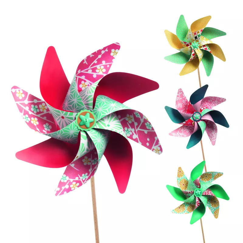 A Djeco Create Sweet Windmills kit of windmills with different colors and designs.