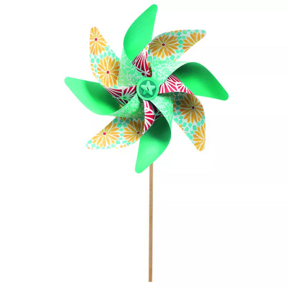 A green pinwheel on a wooden stick, the Djeco Create Sweet Windmills is a creative kit for making FSC® certified windmills.