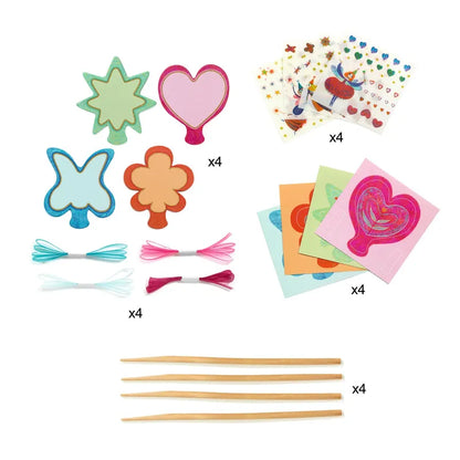 Create an enchanting children's activity with the Djeco Create Little Fairies kit! This delightful assortment includes four shapes (star, heart, butterfly, and flower), four sheets of stickers, four colorful sheets of paper, four bundles of yarn, and four wooden skewers – all arranged neatly on a pristine white background.