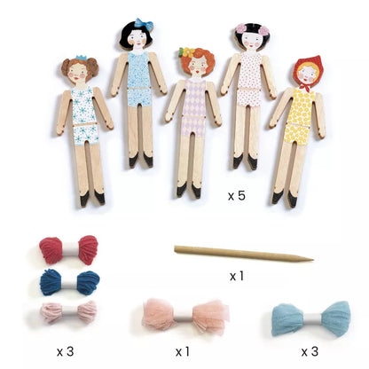 A set of Djeco Create Sweet Night with bows and bobby pins designed as toys for children.