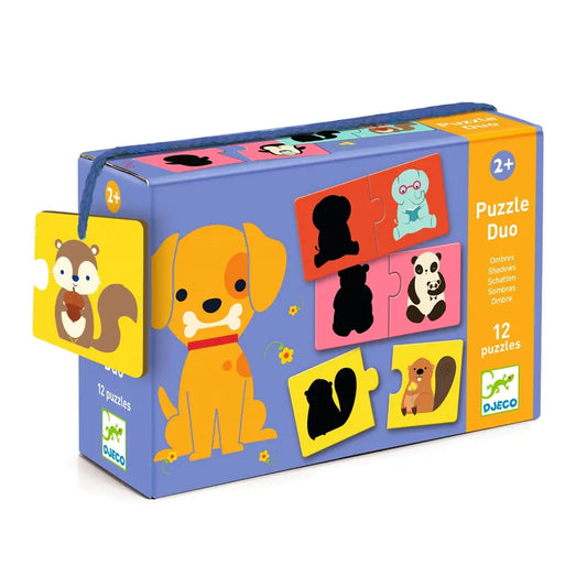 The "Djeco Educational Puzzles Duo Shadows" features a colorful box with a cheerful cartoon dog and animal silhouettes to improve observation skills. Designed for children 2+, it includes 12 matching games with animal illustrations, like a squirrel, and the DJECO logo on the box.