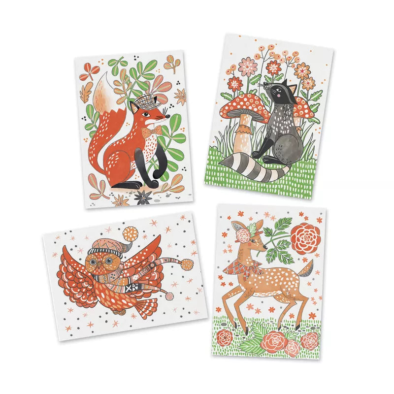 Four Djeco Magic Watercolours Dandy of the Wood cards with animals and flowers on them.