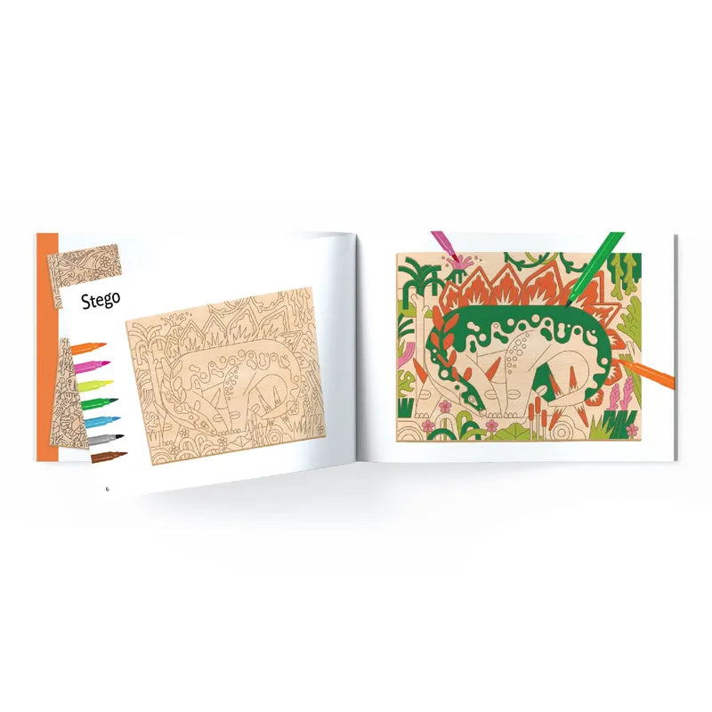 An open coloring book featuring an outlined and a colored page with a stegosaurus illustration, surrounded by a prehistoric, plant-filled background, with laser-engraved illustrations from the Djeco Drawing & Colouring Dino World.