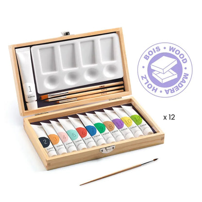 The Djeco Colours For Older Children 12 Gouaches - Artist's Box is open, showcasing twelve tubes of highly pigmented gouache labeled with different colors and numbers, several paintbrushes, and a palette with multiple wells. A "Wood" stamp indicating the material is displayed on the right side.