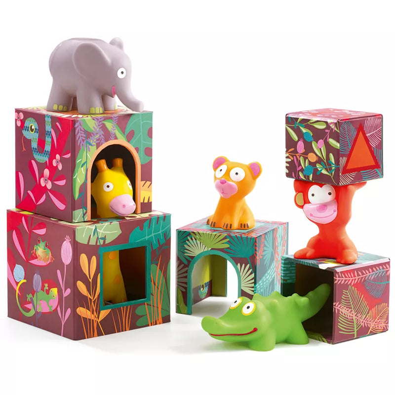 A group of Djeco Maxi Topanijungle toys that are sitting on a table.