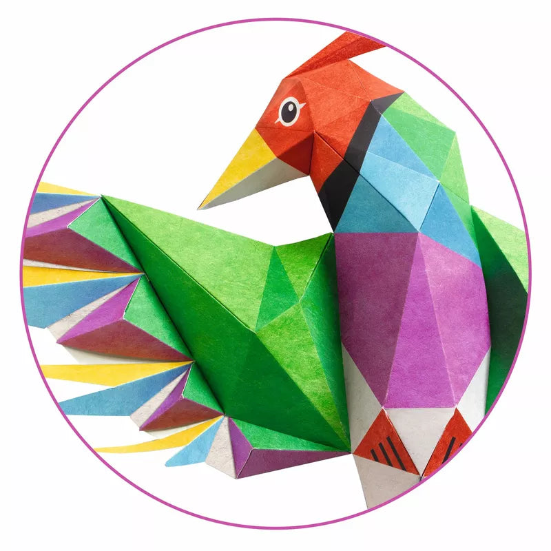 A colorful bird made out of Djeco Paper creations - Amazonie in a circle by Djeco.