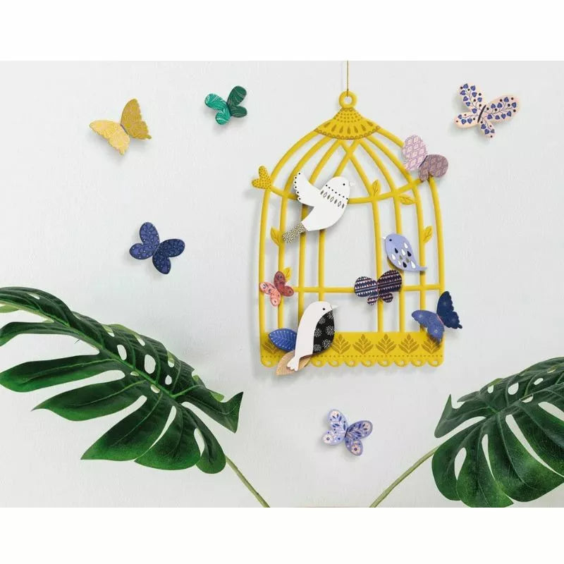 A creative activity to decorate a Decoration Kit Birdhouse with butterflies.