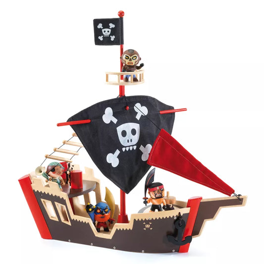 A Djeco Arty Toys Ze pirate boat with pirate flags.