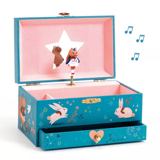 The Djeco Music Box Magic Melody has a toy figure inside of it.