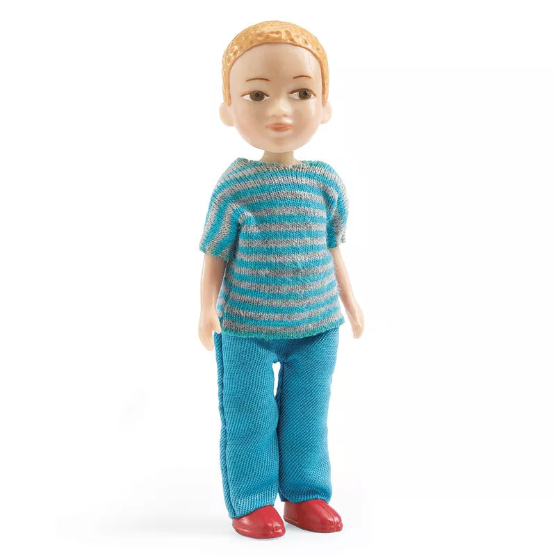A Djeco Dolls Victor wearing blue pants and a striped shirt.