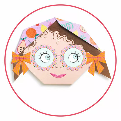 An Djeco Origami Pretty faces with glasses and stickers in a circle.
