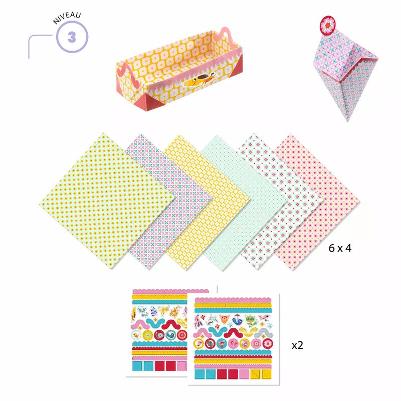 A set of colorful paper with polka dots and Djeco Origami Small boxes perfect for origami projects.
