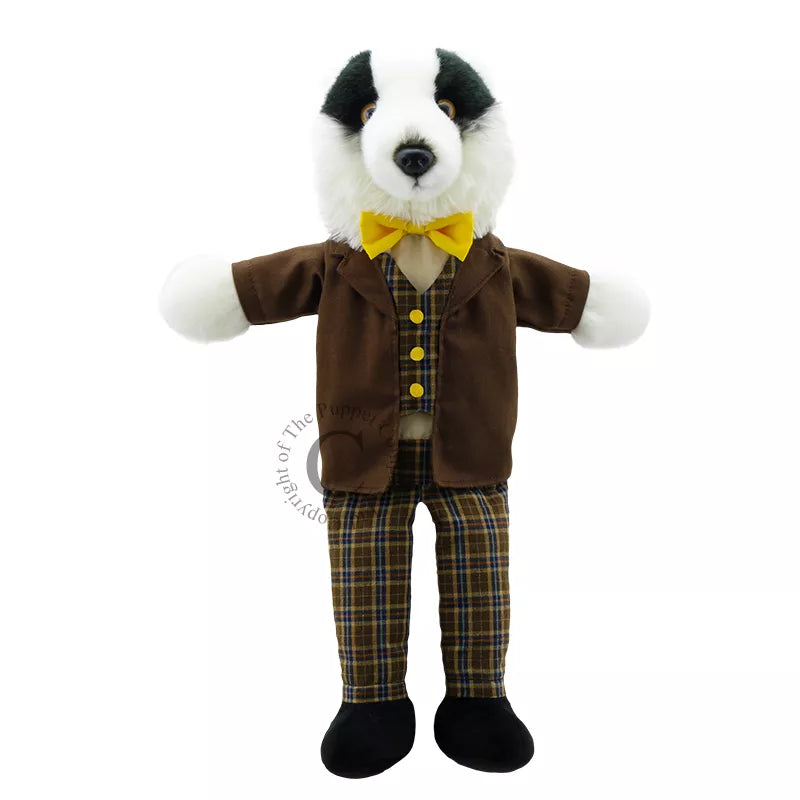 This Animal Puppet Badger is a full bodied hand puppet with smart looking clothes .This badger wears a yellow bow tie and a brown waistcoat.