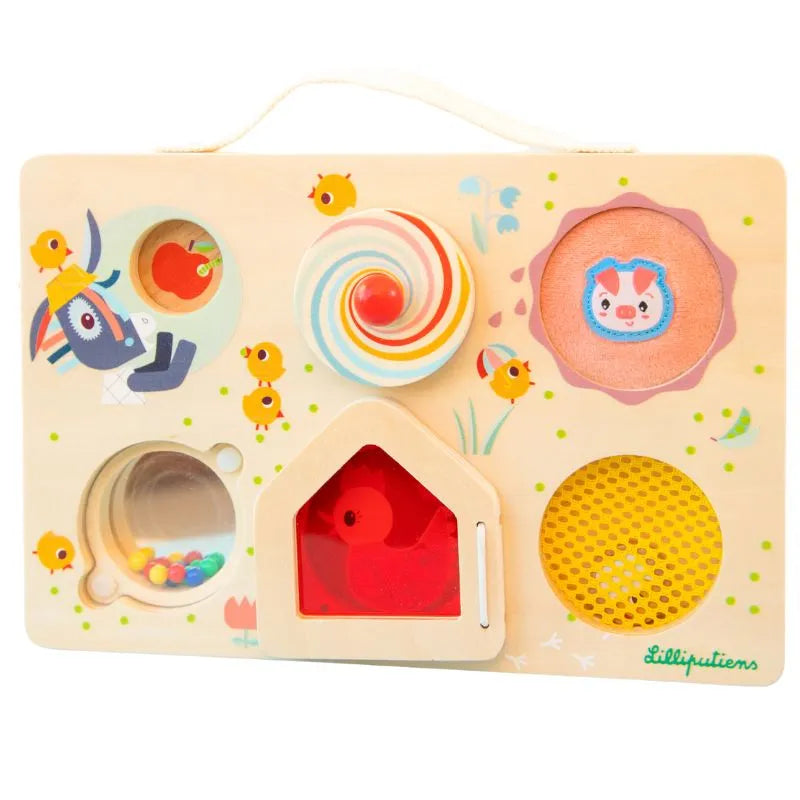 The Lilliputiens Activity Toys Farm Discovery Suitcase is a wooden sensory activity board featuring colorful designs like a donkey with a carrot, spiral, spinning animal, clear bead window, birdhouse, honeycomb pattern, and decorated with small chicks. It's an ideal baby's first toy gift!.