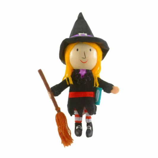 A Fiesta Crafts Witch Finger Puppet hanging from a string with a broom.