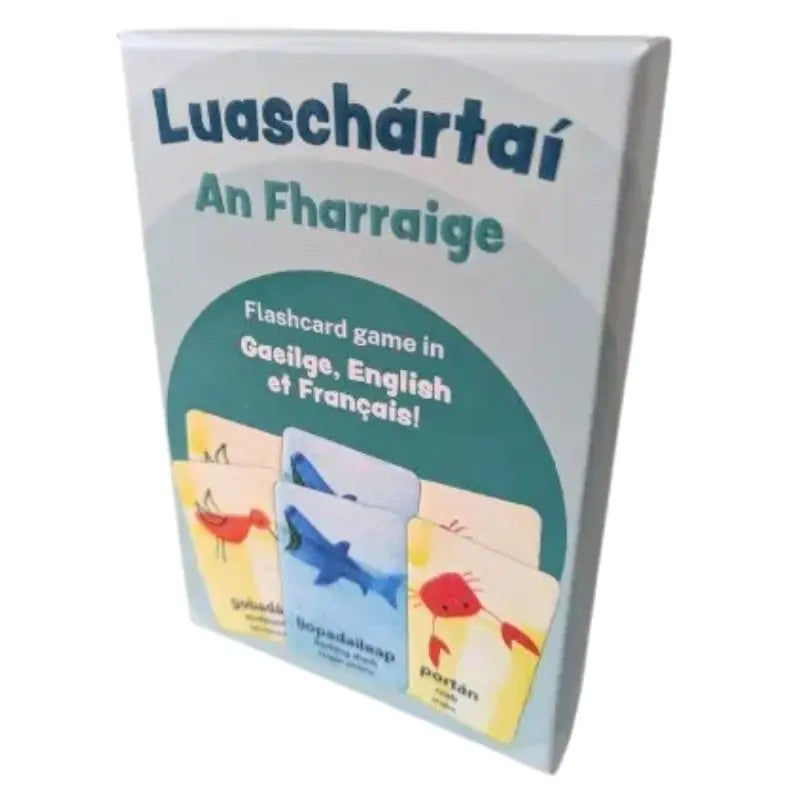 Luaschártaí - An Fharraige: A sea-themed set of trilingual flashcards with playful animal illustrations, labeled in Irish, English, and French. The colorful box shows sample cards for early language learning.