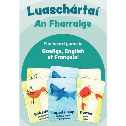 Luaschártaí - An Fharraige: Illustrated trilingual flashcards featuring sea animals in Irish, English, and French—ideal for early language learning. Visible cards include sandpiper, basking shark, and crab.