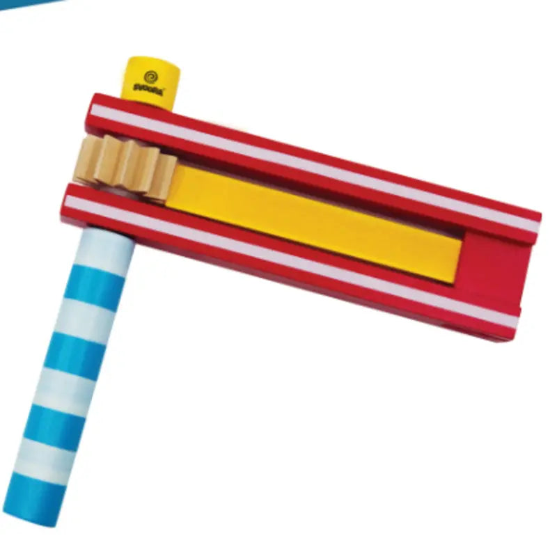 The Football Rattle Red is a vibrant wooden noisemaker featuring a blue and white striped handle, red and white body, and a yellow spinning mechanism—this classic toy is sure to delight kids of all ages.