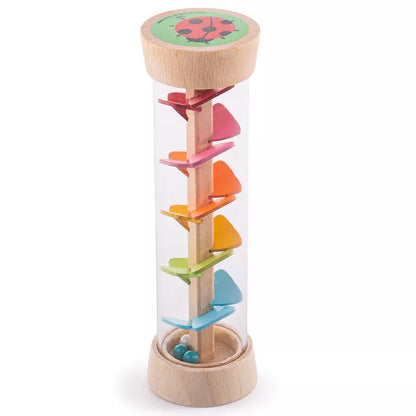 The Bigjigs Garden Rainmaker is a sensory toy made of wood, featuring colorful shapes within it.