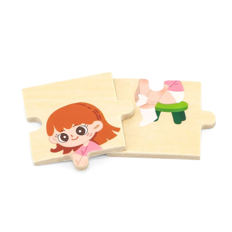 From the Getting Dressed Sequence Puzzle Set, two wooden pieces are displayed as part of a charming 28-piece puzzle. One piece showcases the upper body of a cartoon girl with orange hair, while the other illustrates legs adorned with white socks sitting on a green stool.